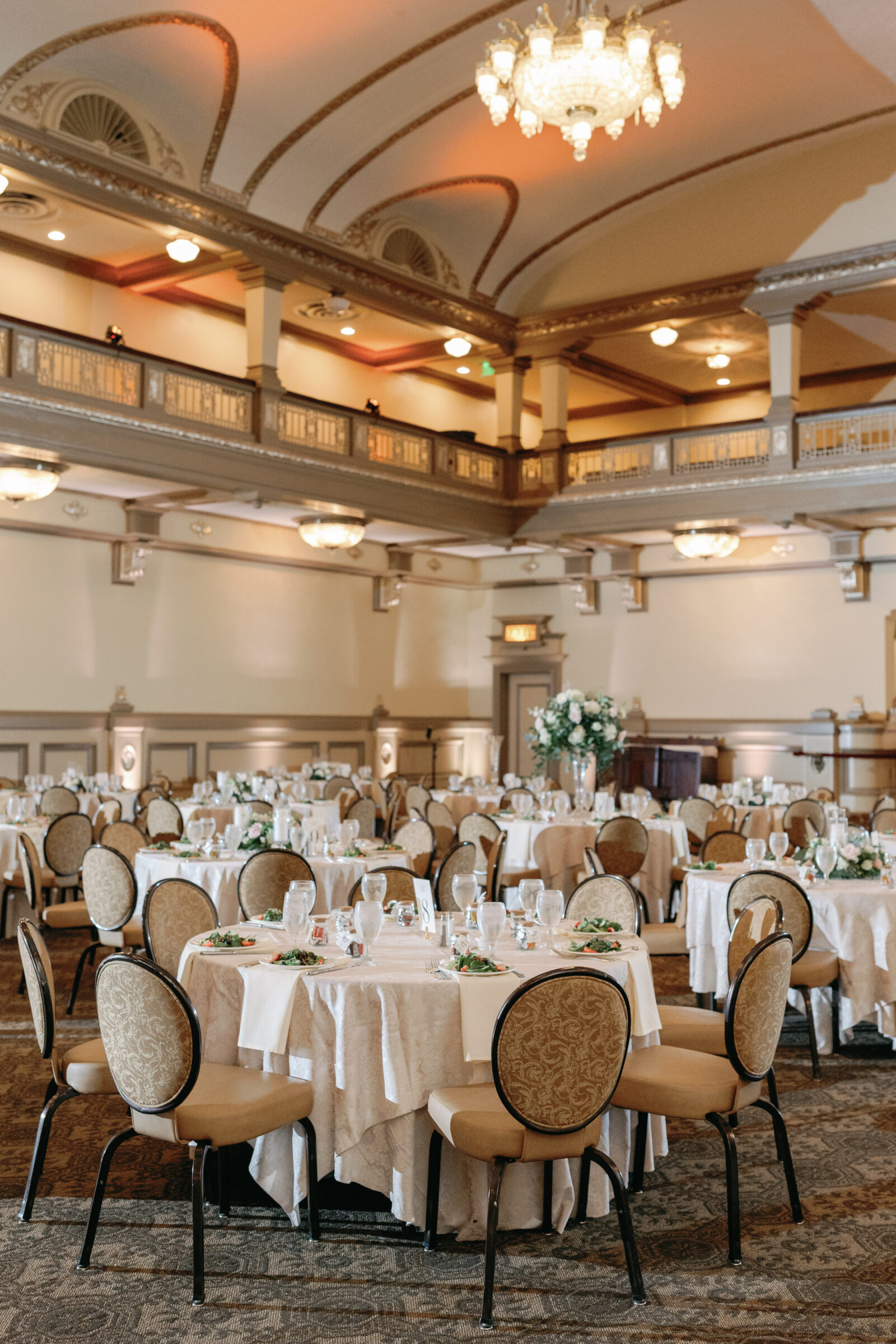 Reception tables set for a wedding dinner in the Marshall Ballroom at the Hotel John Marshall in Richmond VA.