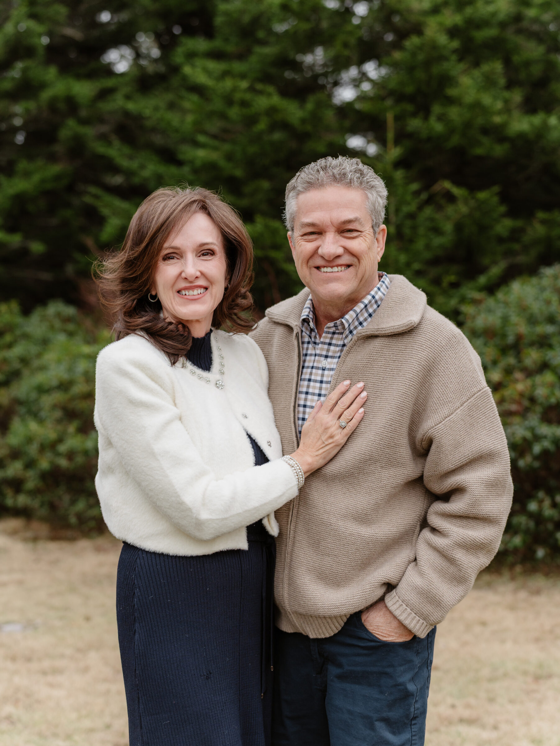 Parents photographed together during a late fall family session at Grayson Highlands State Park in Southwest Virginia