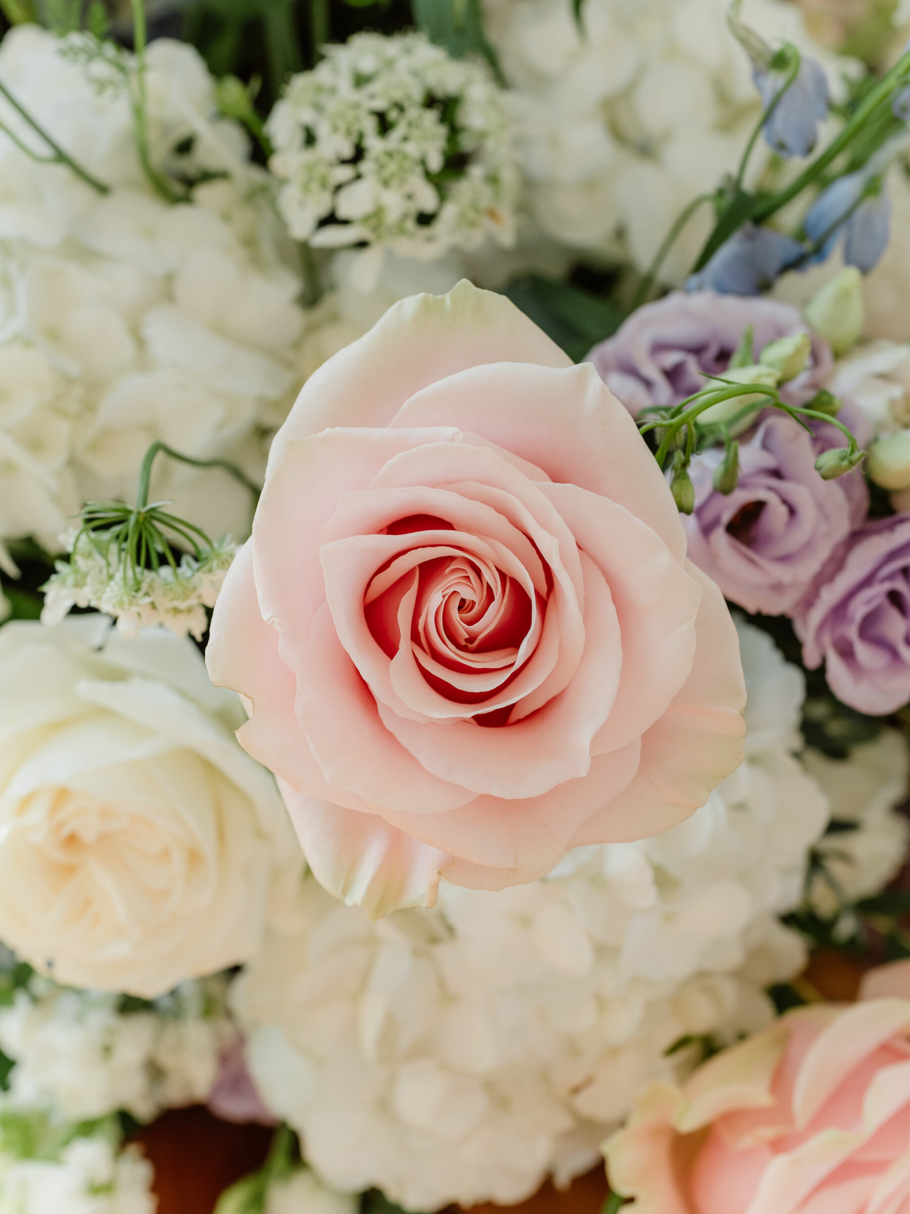 Close-up of pastel florals featuring blush and lavender blooms at a scenic Bluemont VA wedding