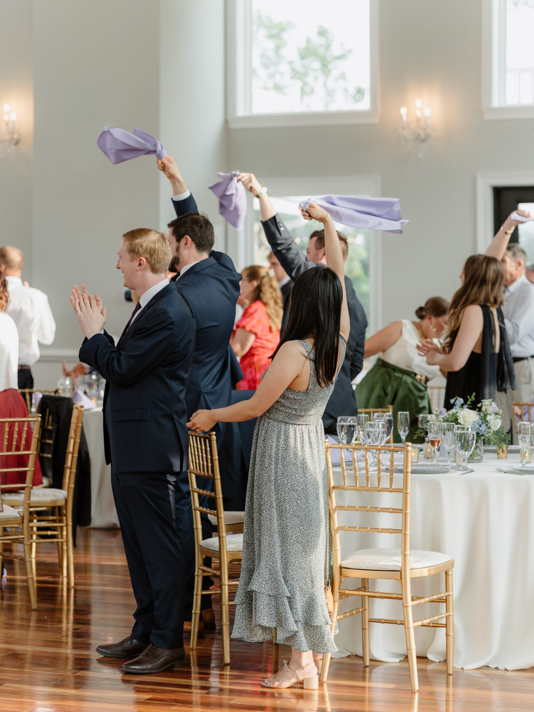 Guests celebrating during the reception in the ballroom at a scenic Bluemont VA wedding